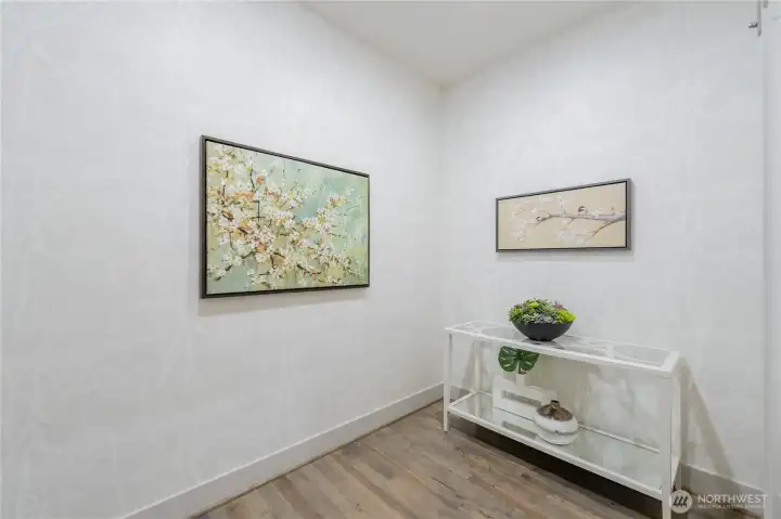 Convenient mudroom by garage entrance.