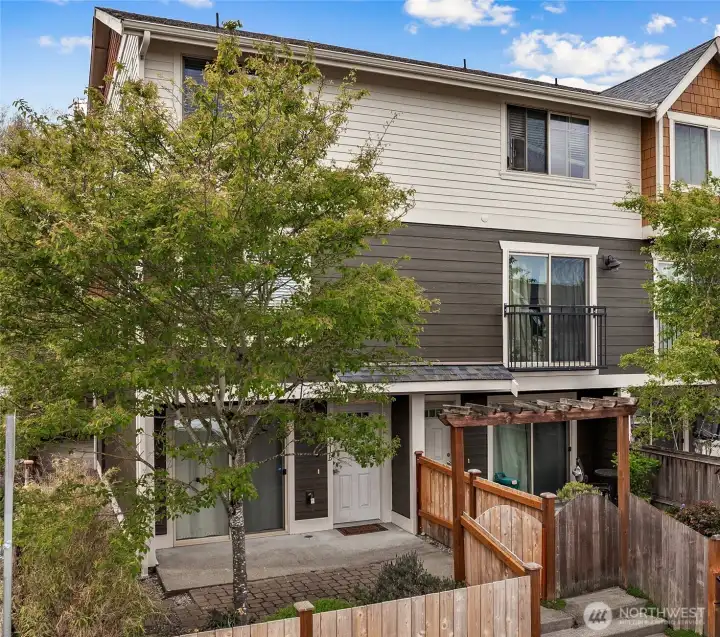 End unit with yard and southern exposure.