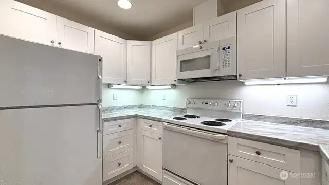 Kitchen with ample cabinet space-new cabinets and countertops