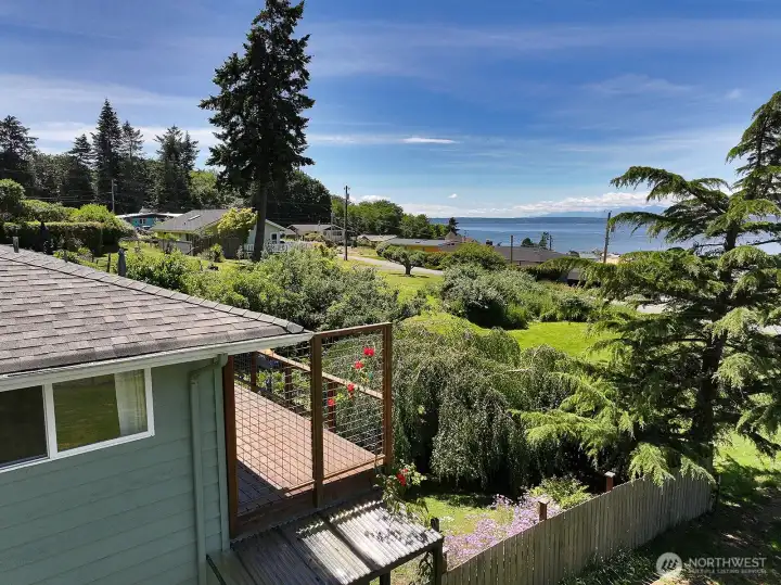 Another shot to orient you with the water view and backyard. The window here is to the primary bedroom on the main floor.