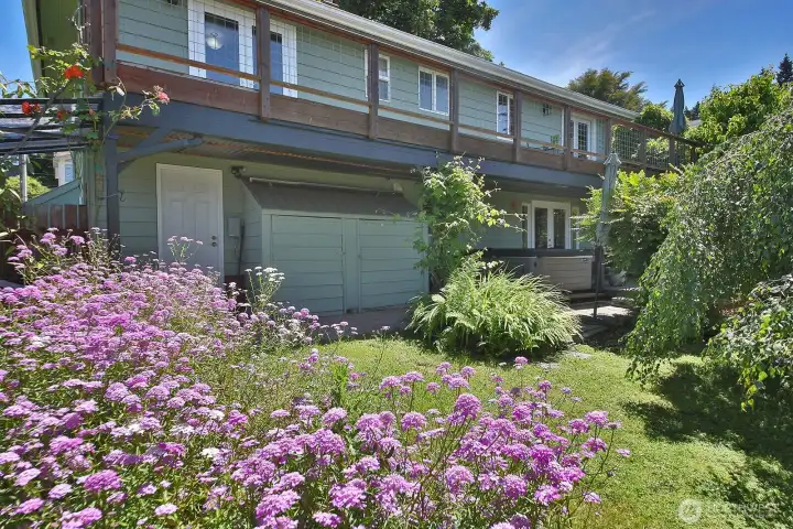 Here we see the attached storage/garden shed and the hot tub and get a sense of the garden.