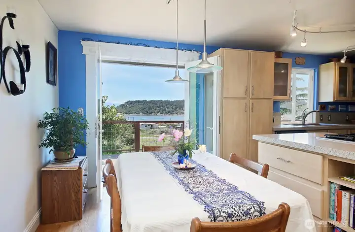 French doors open onto the deck for indoor/outdoor dining.