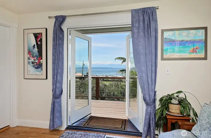Water views from the primary bedroom.