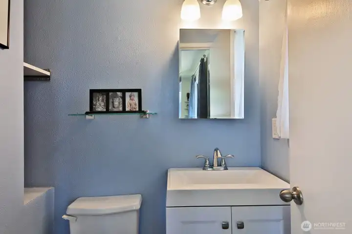 Half bath off the primary bedroom.