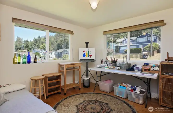 Second bedroom on the main floor, used as an art studio.