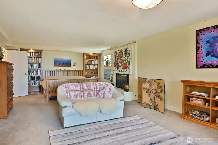 To the photographer's back are french doors leading to the hot tub, lower deck and beautiful garden and of course that incredible view.