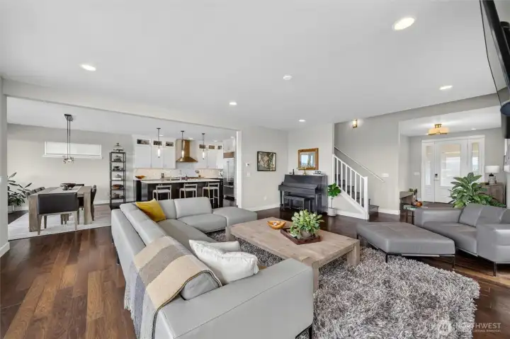 Open floor plan with stairs leading to the upper floor Open floor plan with stairs leading to the upper floor