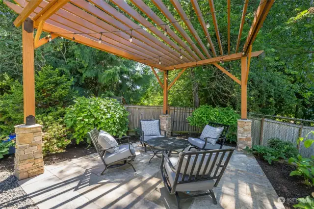 Large arbor awaits evenings with friends over a glass of wine.