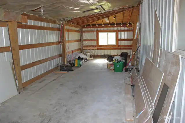 covered storage off the end of the shop