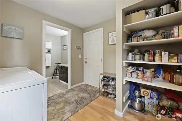 2nd view of mudroom, showing 3/4 bath, garage access, and plenty of storage.