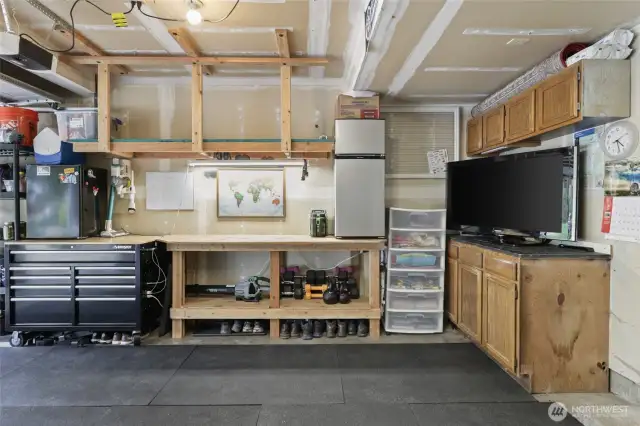 2 car garage with lots of included shelving/storage!