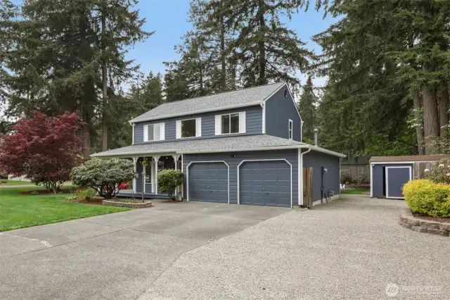 Loads of space, with RV parking through gate! Outbuilding for all your tools, too!
