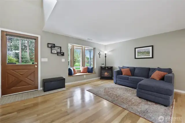 Bright Entry, looking out past the wrap-around porch
