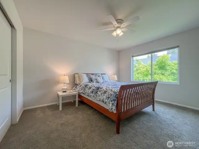 The third bedroom facing east -with views of beautiful, mature tree growth- is quiet and full of design possibilities.