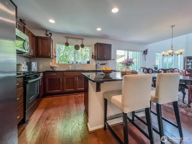 The kitchen flow is fantastic- enjoy the huge island for casual eating and buffet style eating. Lots of counter space with easy access to fridge, stove, and sink.