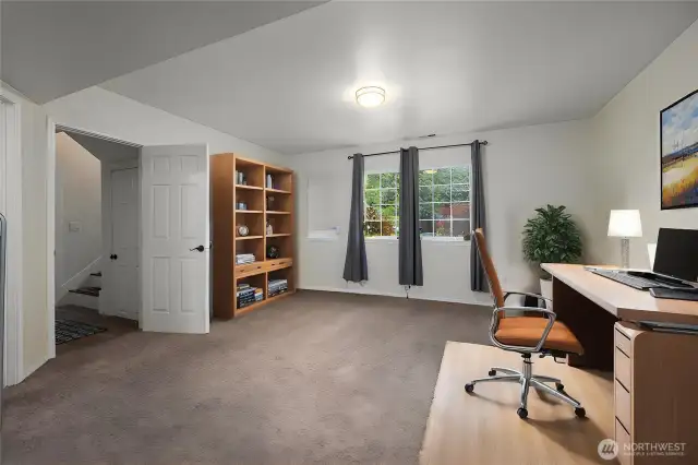 opposite side of downstairs living space Virtually staged