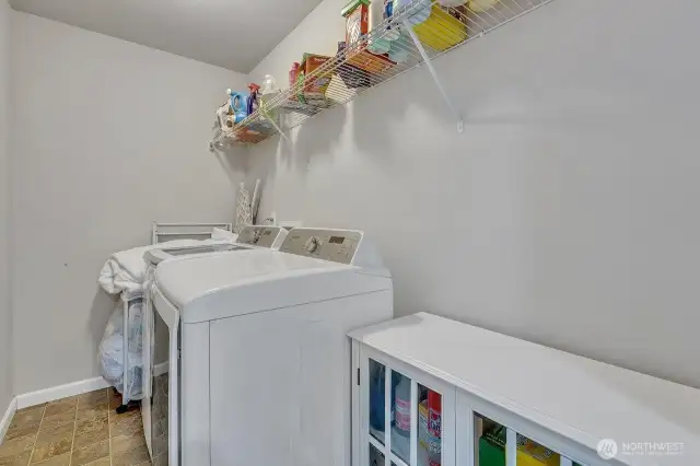 Large upper level laundry room.