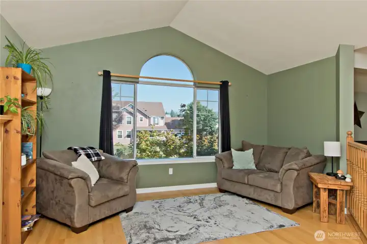 Living room with vaulted ceilings