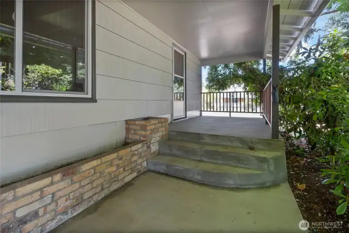 Covered porch entrance off living room