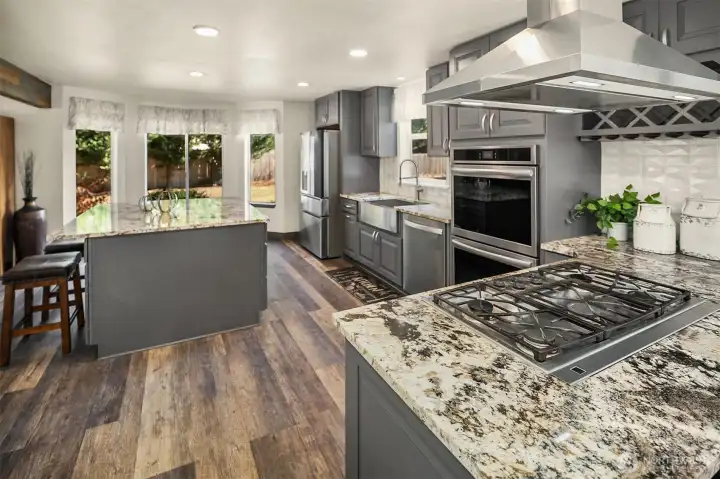Granite countertops throughout.  Stainless steel appliances.