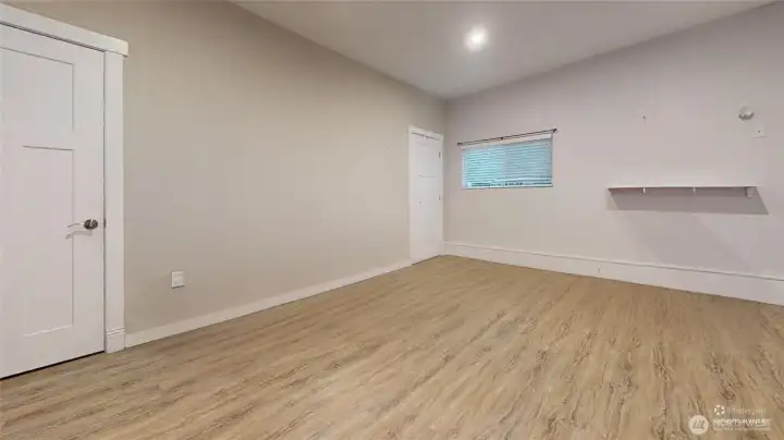 DADU space with closet and access to the garage storage area