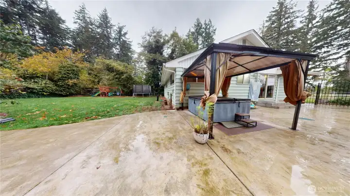 Hot tub, gazebo, play system and trampoline all stay with the property