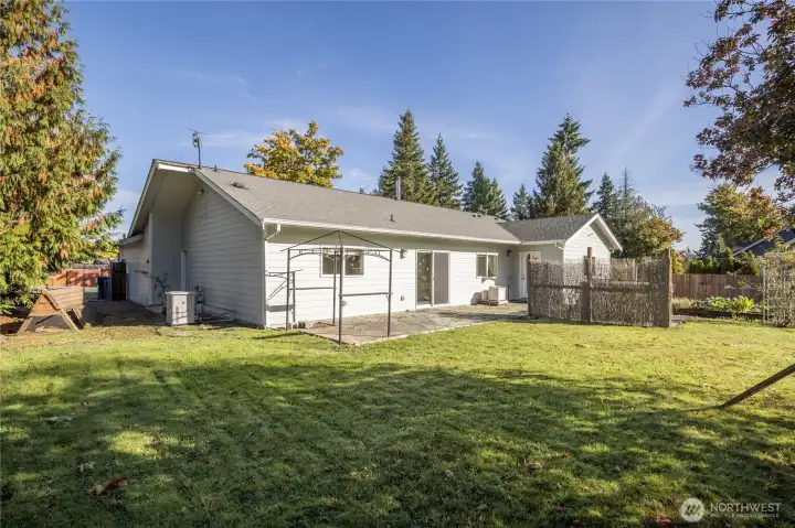 Well-maintained rambler on a large level lot over half an acre!
