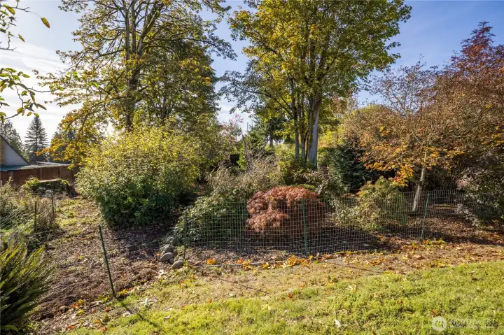 Enjoy the natural beauty of your private wooded area at the back of the property