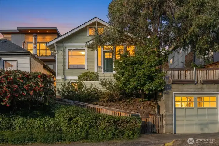 Sitting up from the street provides privacy, great natural light, and views of Mt. Rainier from the bedroom