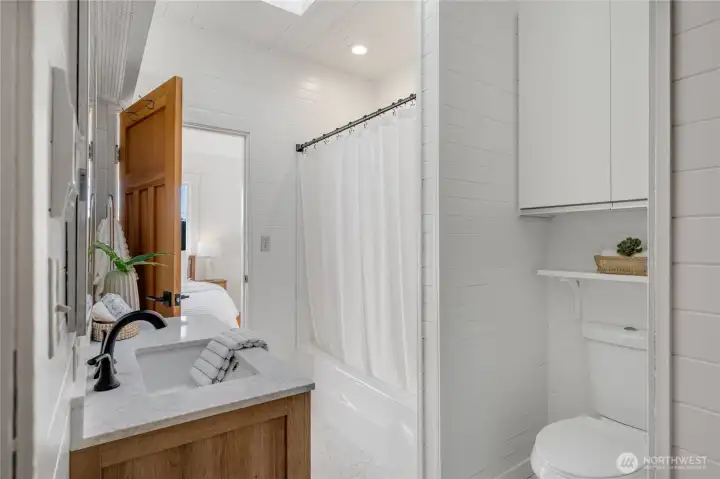 freshly painted, new vanity, and new flooring