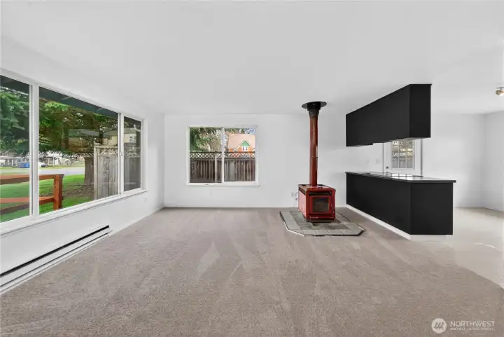 Oversized windows fill the space with natural light