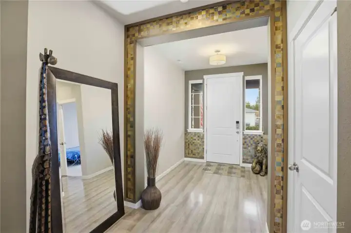 Entryway with stunning artistic detail in the gracious entryway.