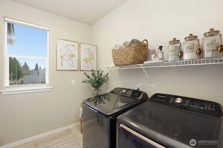 Laundry is located upstairs. (digitally staged)