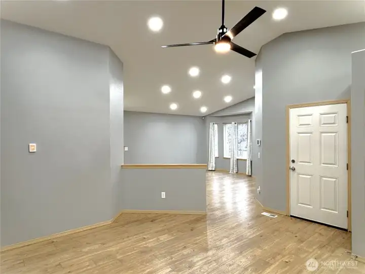 Flowing entertaining-style living and dining with theatre style ceiling lights throughout.