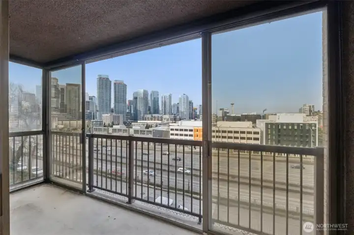 Enclosed balcony with epic downtown view.