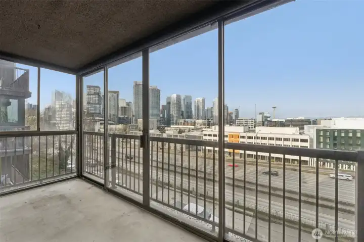 Enclosed balcony means more living space in your custom enclosed balcony with door for fresh air.