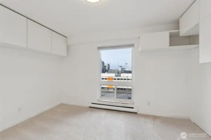 Downtown views in your private bedroom.