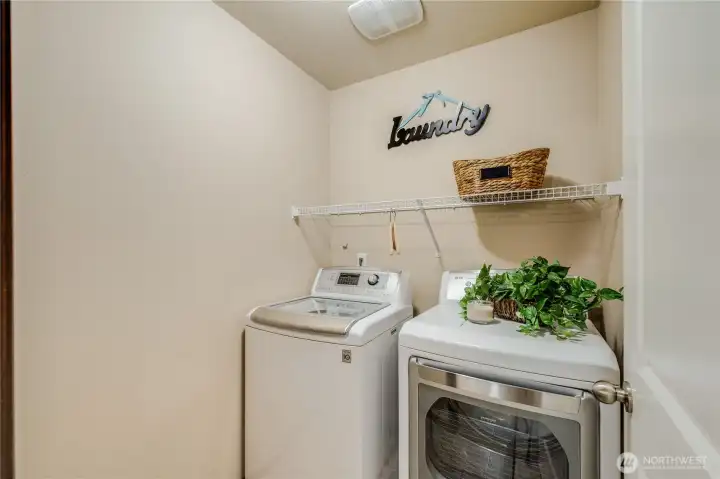 Laundry is upstairs where it makes sense! Washer & Dryer STAY!