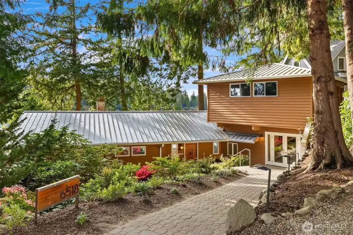 Mint condition move in ready home nestled into its beautiful setting.