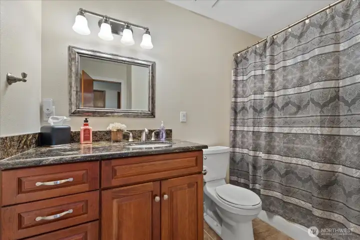 Conveniently located upstairs level bathroom