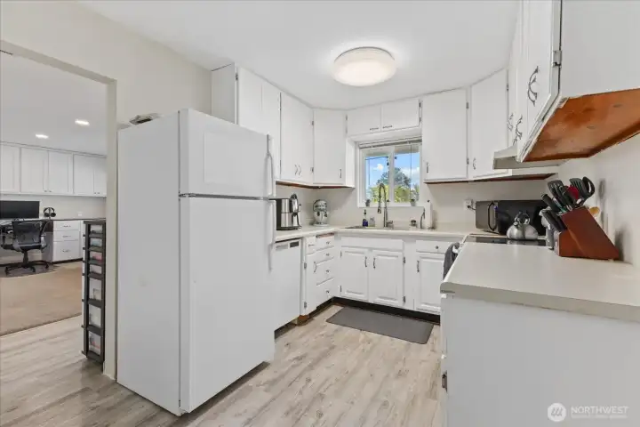 Detached ADU kitchen with easy flow to living area.