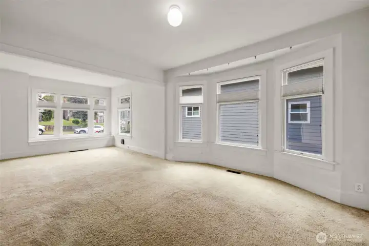 Oversized windows and tall ceilings thought main floor.
