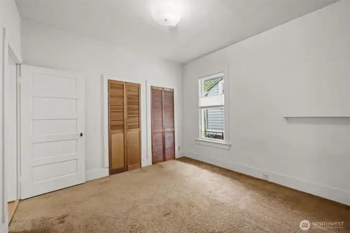 Comfortable bedroom with classic character and versatile layout options.