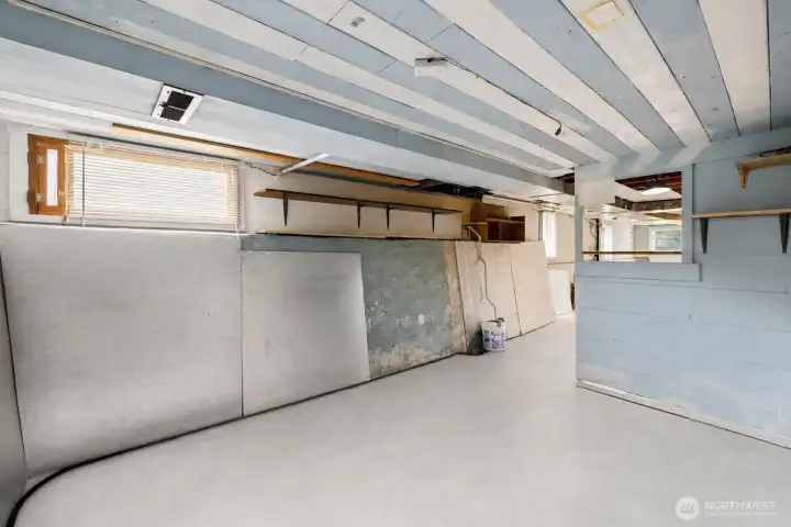 Unfinished basement with endless possibilities for expansion.