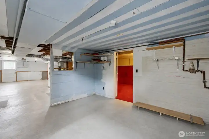 Unfinished basement with endless possibilities for expansion.