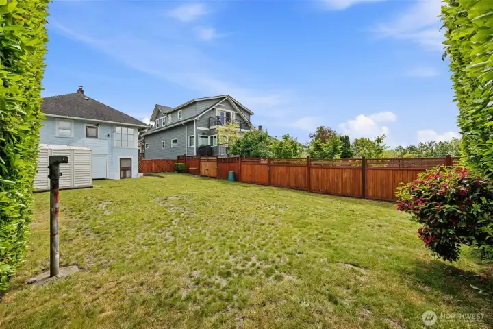 Oversized yard, level and full of potential.