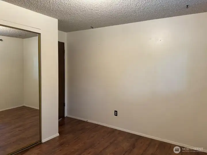 Plenty of storage for a bedroom with this double sliding door closet. Plenty of storage for a bedroom with this double sliding door closet.