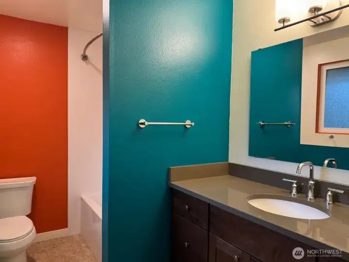The colorful private primary bath has also been updated The colorful private primary bath has also been updated
