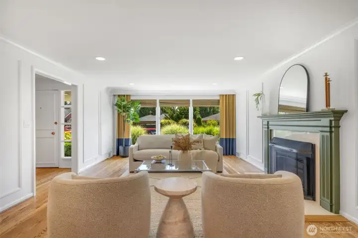 Gas fireplace and newly refinished hardwoods throughout the main floor. Gas fireplace and newly refinished hardwoods throughout the main floor.
