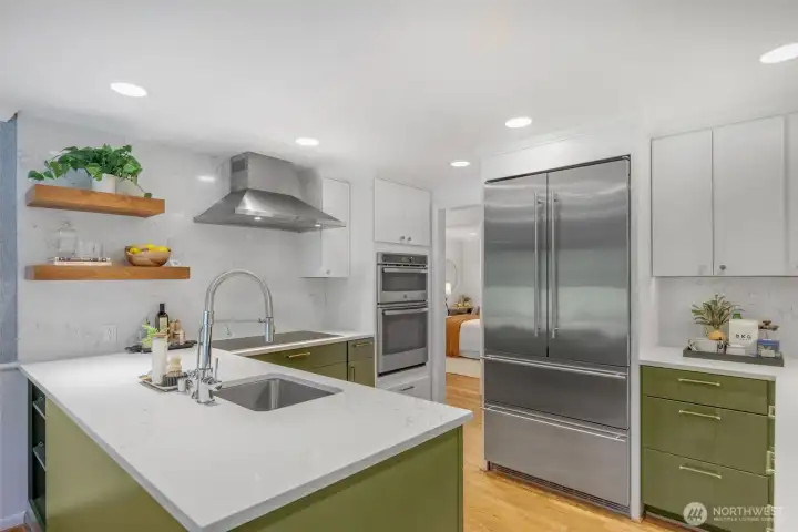 Remodeled kitchen complete with stainless steel appliances and plenty of storage Remodeled kitchen complete with stainless steel appliances and plenty of storage